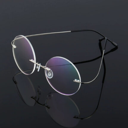 Lunettes sans monture rétro en alliage de titane rond super élastique