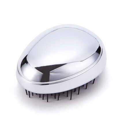 Peigne à cheveux en forme d’œuf. Peigne à cheveux droit portable et agile